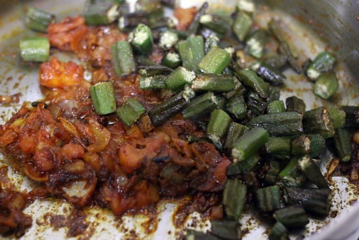 fried bhindi added to prepared onion tomato masala