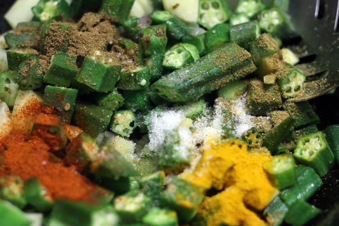 adding spice powders for okra rice