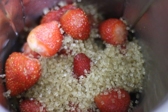 hulled strawberries and sugar