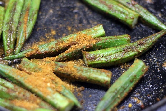 Bharwa bhindi is a popular Indian okra fry with a flavorful dry spice stuffing. Bharwa means stuffed and bhindi means okra in Hindi. This is a vegan gluten free stuffed okra fry that tastes so good with rice or roti. Here is how to make bharwa bhindi easily at home. bharwa bhindi recipe making