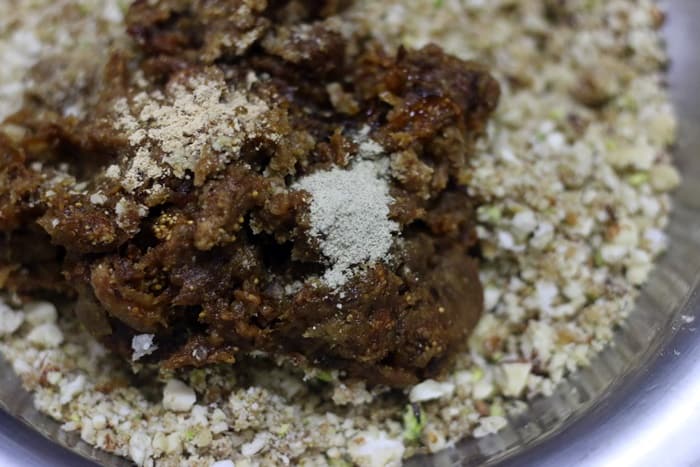 preparing dry fruits laddu