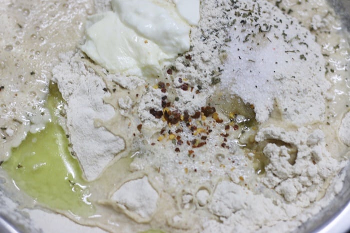 kneading dough for paneer pizza