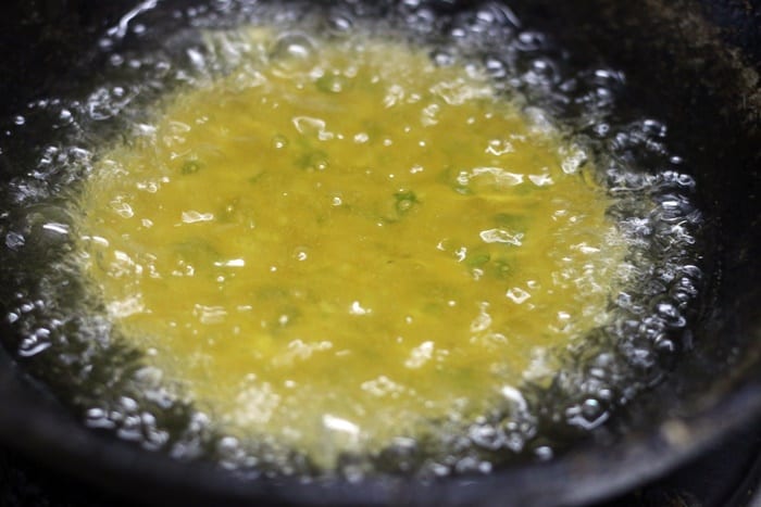 frying bedmi puri