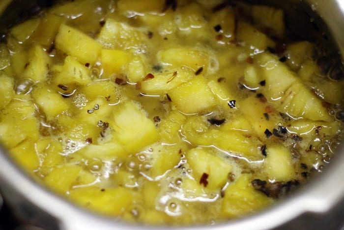 water added to sugar-pineapple mixture for making chutney
