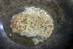 sautéing cumin seeds in oil