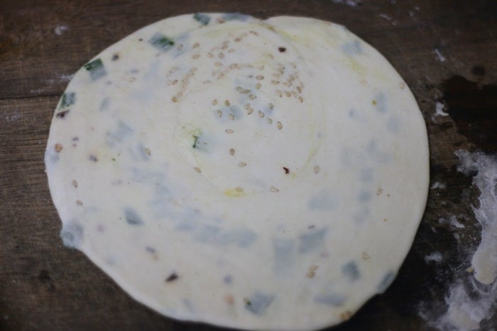 Rolled scallion pancake ready to cook
