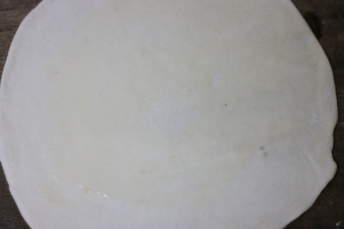 Dough rolled into thin circle for making scallion pancakes