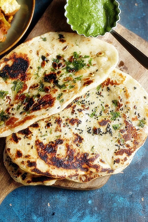 overhead shot of vegan naan topped with sesame seeds