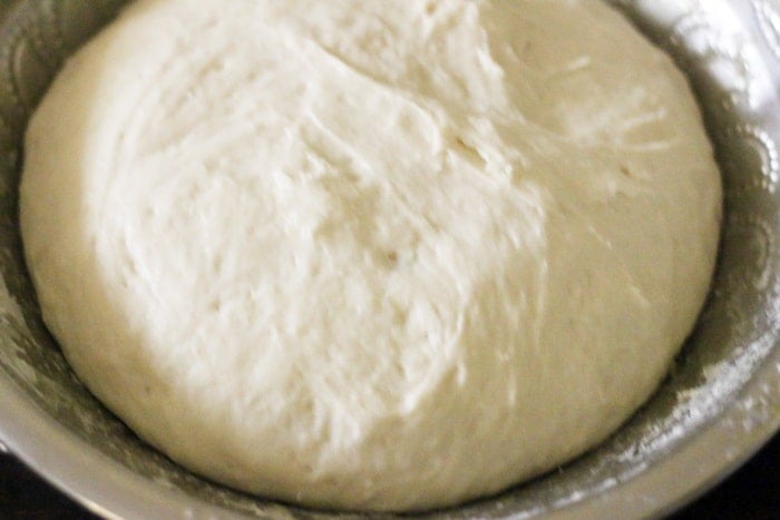 naan bread dough leavened with yeast