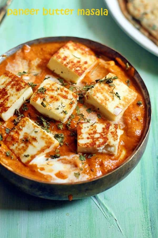 restaurant style paneer butter masala served in a copper bowl