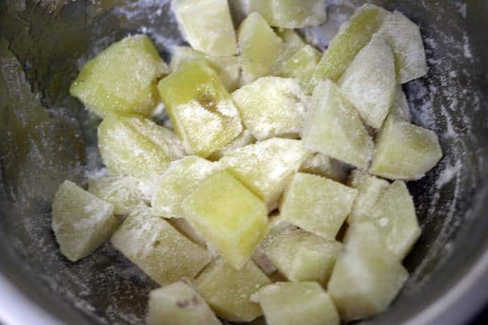 parboiled potatoes tossed in rice flour