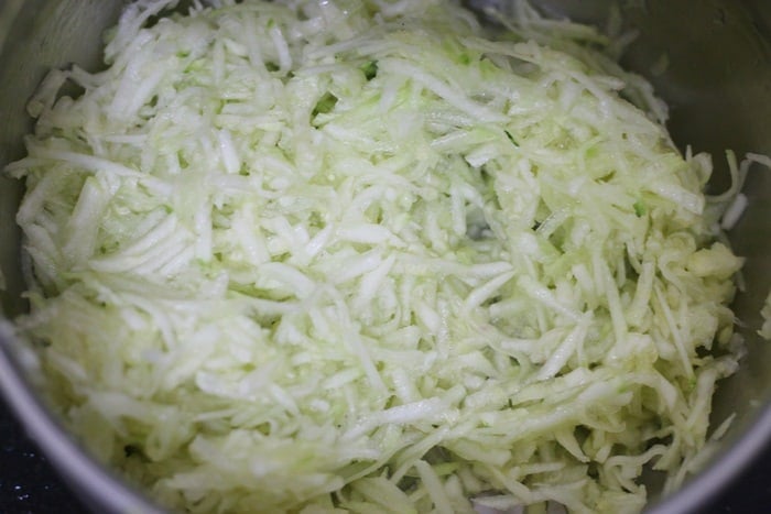 grated zucchini in a bowl