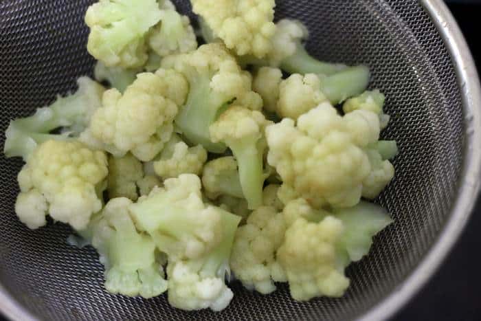 drained par boiled cauliflower florets
