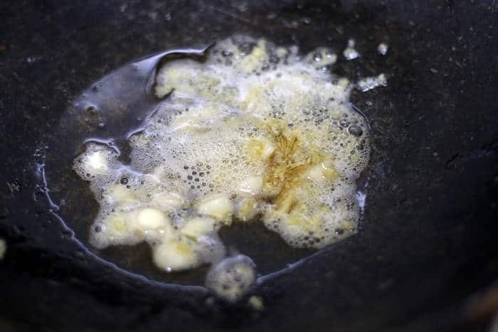 Frying onion garlic for kung pao sauce