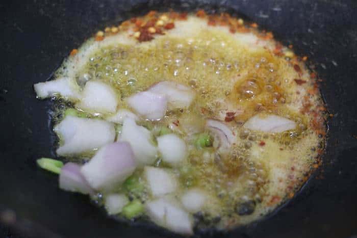 sauteing ginger garlic chili flakes in sesame oil