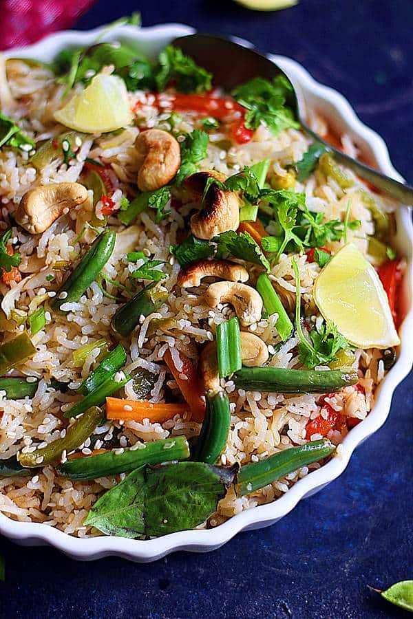 Thai fried rice topped with roasted cashews