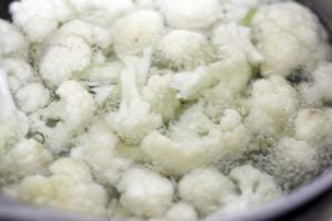 blanching cauliflower in hot water.