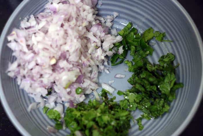 chopped onions, green chilies and coriander leaves for making raita