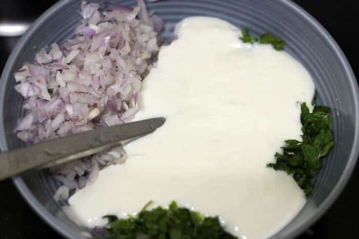 whisked yogurt added to chopped onions