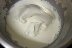 chilled cream in a mixing bowl