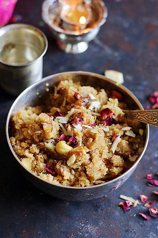 sooji halwa served in a silver bowl