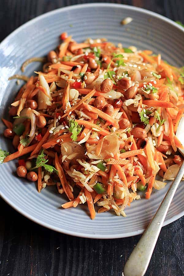 Thai carrot salad in a grey ceramic plate