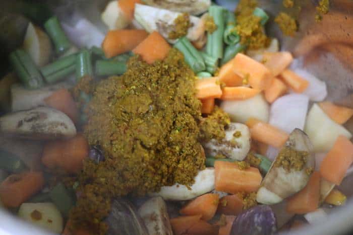 curry paste added to sauteed vegetables