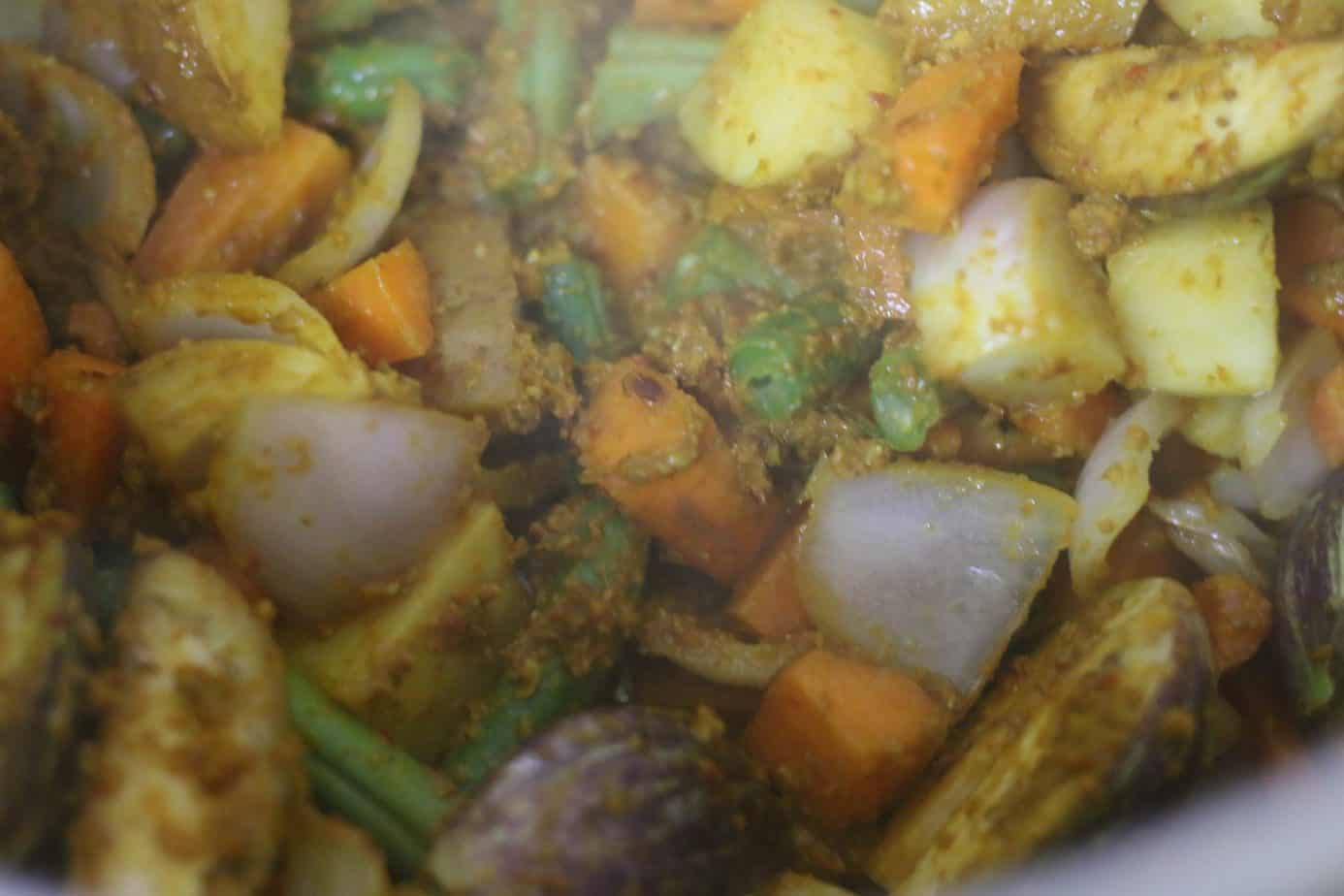 cooking vegetables in curry paste