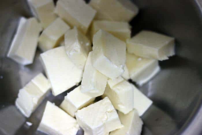 cut tofu added to yogurt marinade