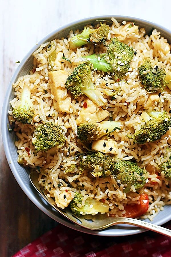 broccoli fried rice in a grey ceramic bowl
