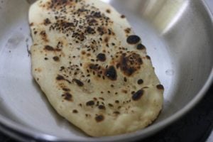 butter applied on kulchas