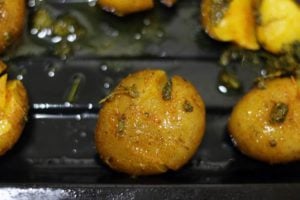 seasoned smashed potatoes ready to bake