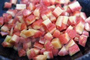 chopped carrots added to tempering for poriyal