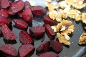 roasting beets and walnuts in a cast iron pan.