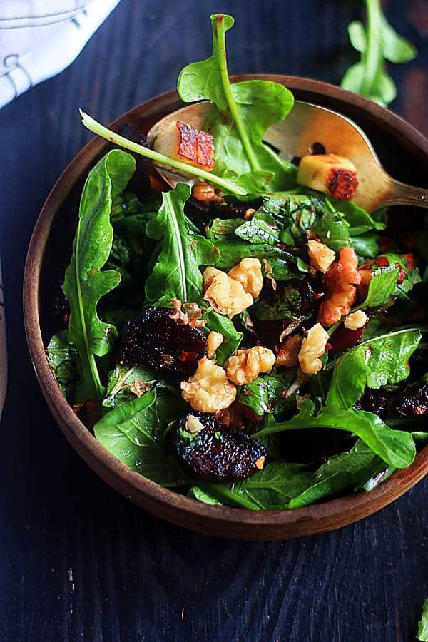roasted beet salad with arugula leaves in a balsamic dressings