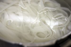 boiling rice noodles in water