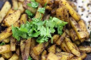 coriander leaves added to potatoes