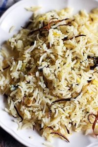 biryani rice or kusks served in a ceramic plate