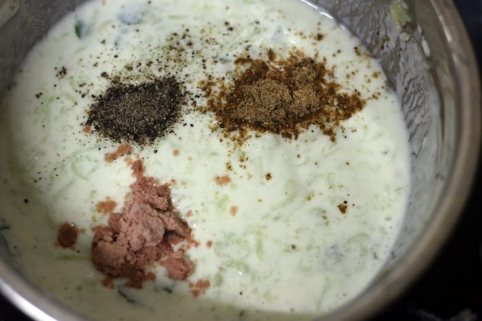 spice powders and salt added for making cucumber raita