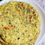 Gujarati methi thepla served in a white plate