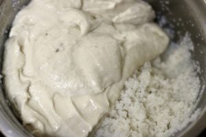 mixing urad dal paste with rice rava