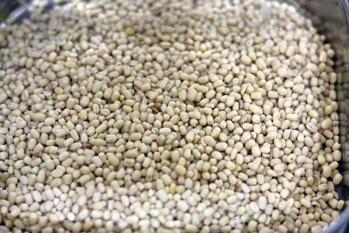 rinsed whole urad dal in a bowl