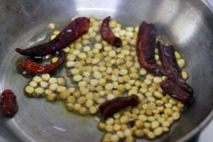 frying chana dal and red chili for chutney