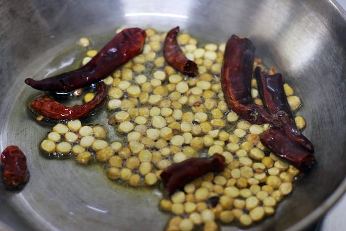 frying chana dal and red chili for chutney