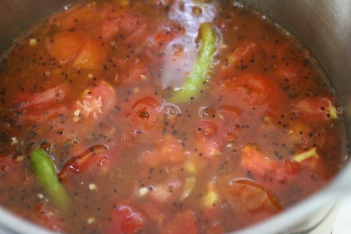 making tomato rasam recipe
