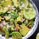 cucumber salad with avocado in a salad bowl