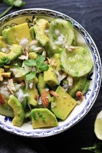 cucumber salad with avocado in a salad bowl