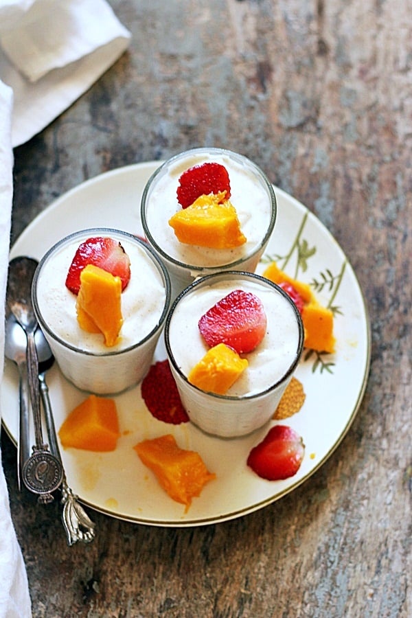 three glasses of white chocolate mousse