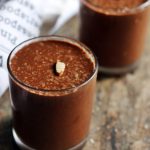 homemade chocolate smoothie served in a served in two glasses.