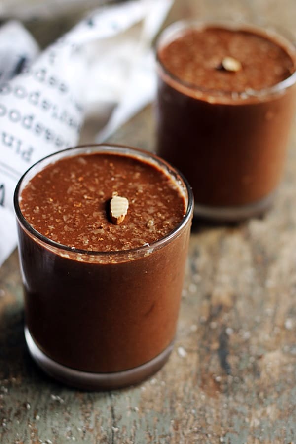 homemade chocolate smoothie served in a served in two glasses.
